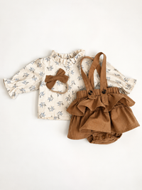 clara set flatlay 3pc with shirt skirt and tan bow